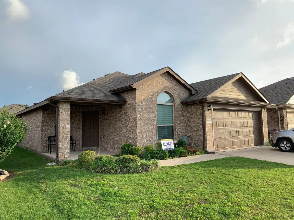 Single-story home with a finished shingle roof