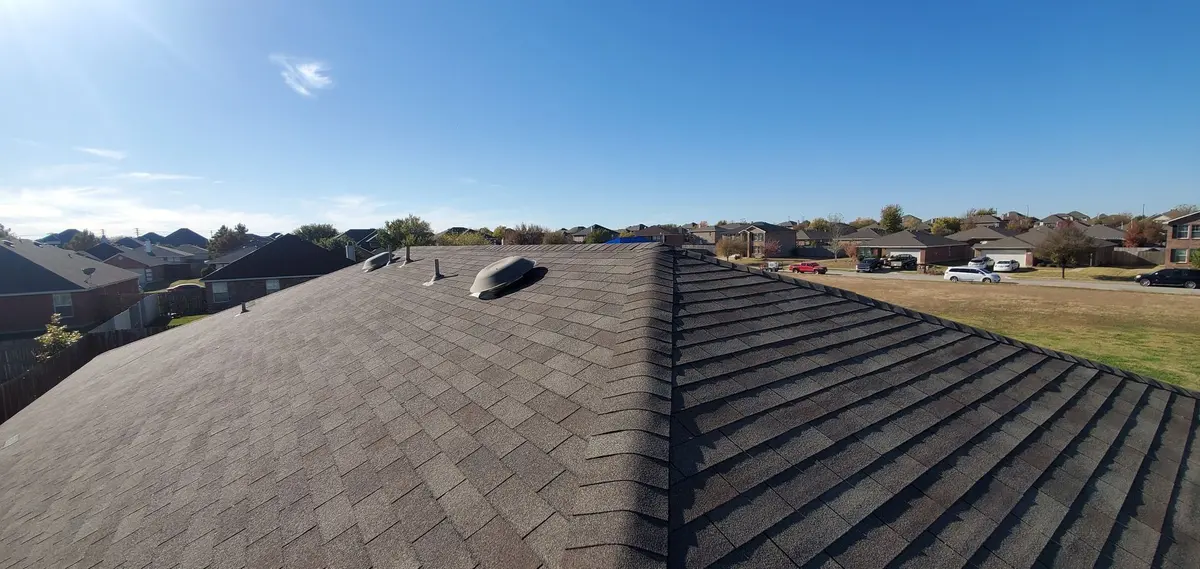 View along the ridge of a shingle roof on a San Antonio area home